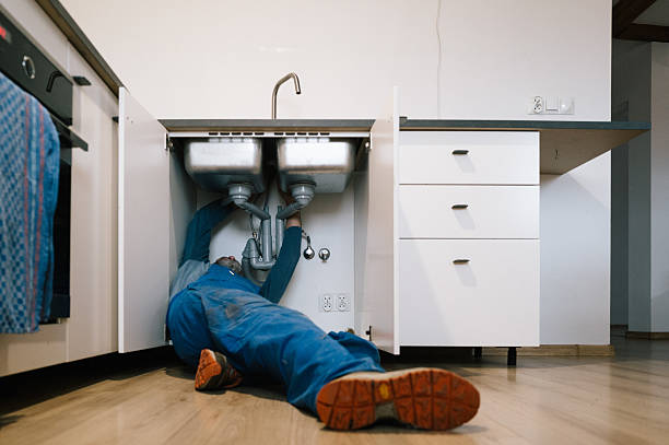Professional Drain Cleaning technician working in Beaverton, MI